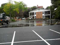 Another view of the seam between the traditional and porous pavement portions of the parking lot.