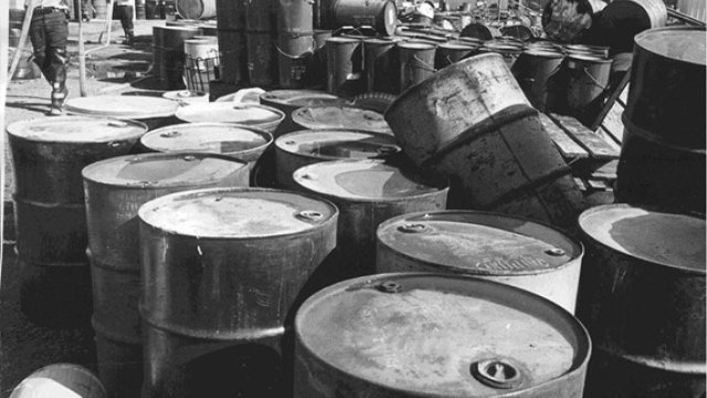 Historical photo of chemical drums