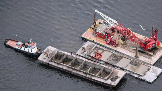 photo of Dredge material sourced from the East Gate Basin being placed at the 40th Ave. Site. (Photo Credit: Nelson French previous AOC coordinator)