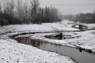 Winter 2013: Completed: New meandering stream and habitat structures.