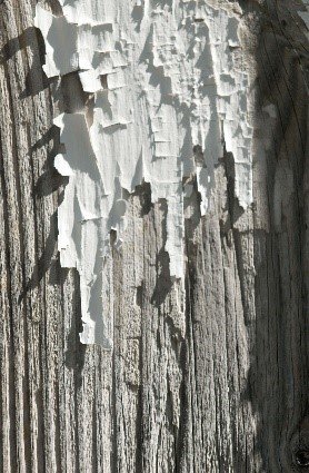 A visual example of lead paint flaking off.