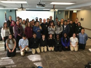 Student pose for picture with Governor