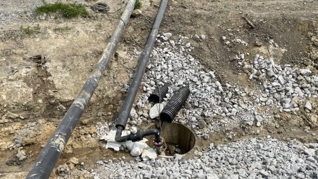 Sumps collect and pump rain and creek water from around the derailment site