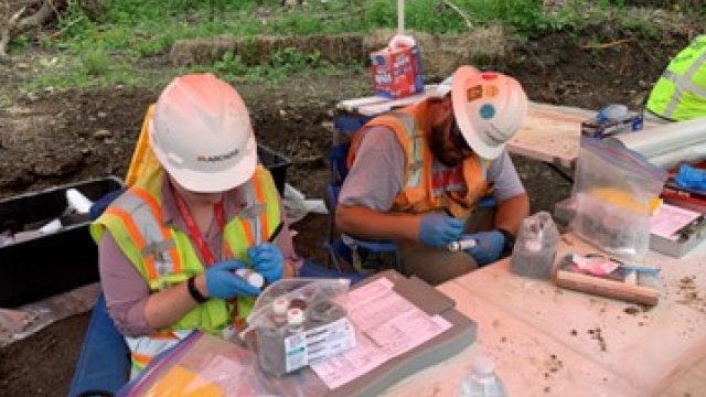 Contractors labelling soil samples