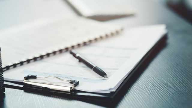 image of clipboard on desk