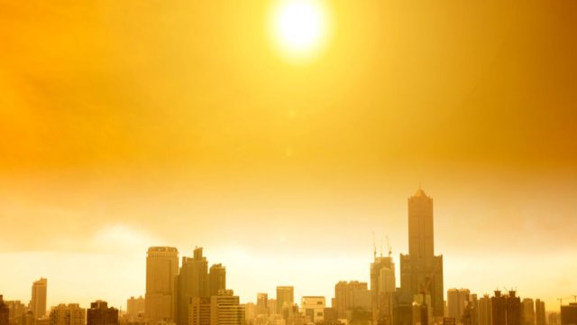 Hot sun over cityscape