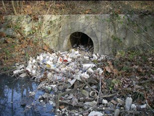 Trash at storm water drain near the Great Lakes 