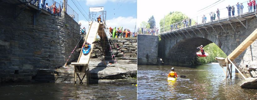 Kayakers sliding down the kayak kicker ramp at Willimantic Whitewater Park