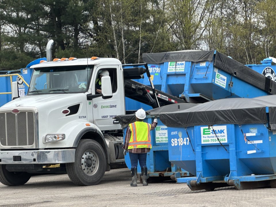 Waste is safely secured and loaded for offsite disposal