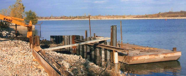 North corner of site with some sea wall and north wall sheet piles driven.