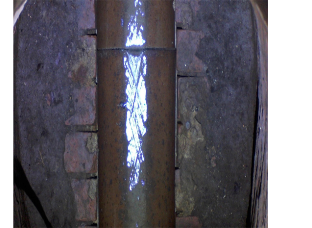 Visual monitoring image of the Flowing Water Scope, showing water moving through a pipe.