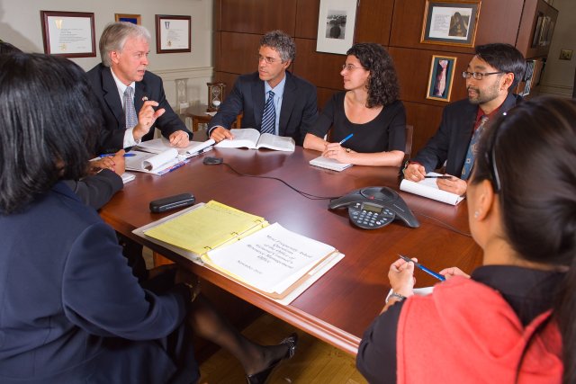 stock image of people at a table