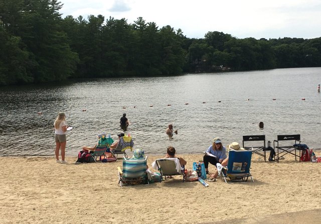 Researchers conduct water quality study at a pond in Rhode Island