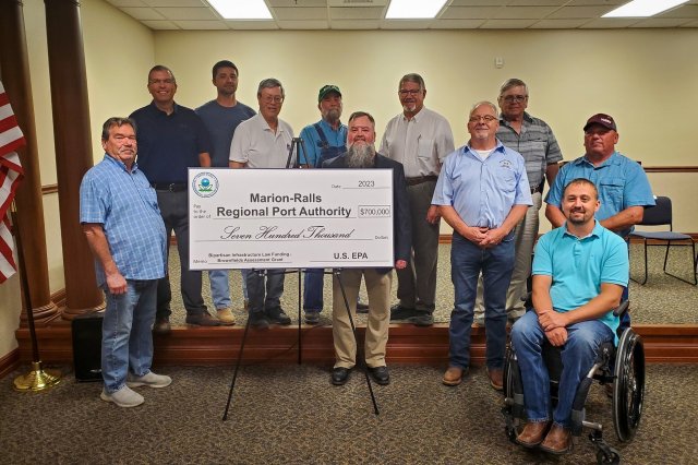 Group shot of ceremonial check recipients