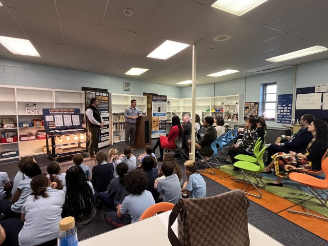 EPA and partners are seen in a school classroom with kids.