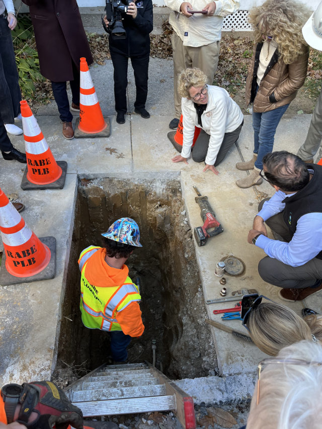 EPA and partners watch as a lead service line gets replaced in the ground.