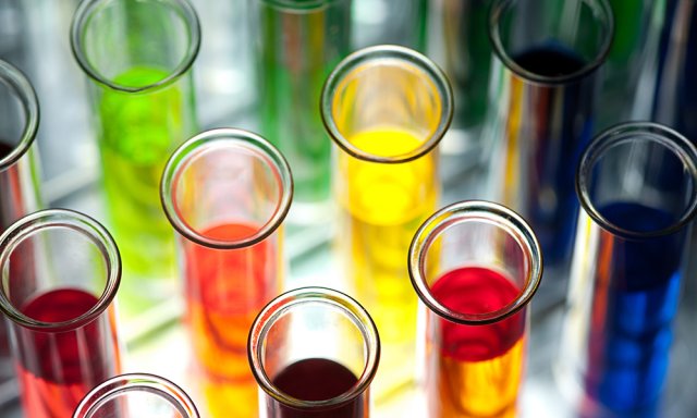 Test tubes with different colored liquids inside