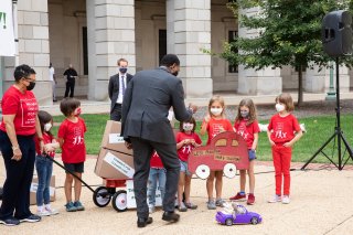 Administrator Regan with children