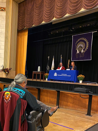 EPA Region 7 Administrator Meg McCollister and Haskell Indian Nations University Interim President Julia Good Fox sign a Memorandum of Understanding (MOU) formalizing the organizations’ partnership to promote environmental outreach and student career opportunities during the signing ceremony at Haskell Auditorium on Oct. 19, 2022.