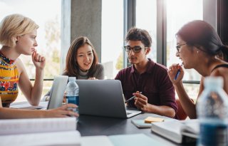 Students sitting in a meeting