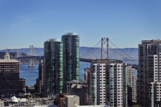 Skyscrapers with the San Francisco Bay Bridge in the background