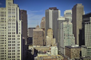 A city skyline showing various concrete surfaces that absorb and hold heat