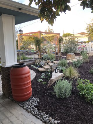 Barrel in a yard.