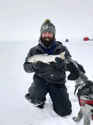 Ryan Lepak holding a trout.