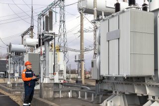 Engineer working at an electrical substation