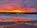 Sunset at the beach, aside the ocean